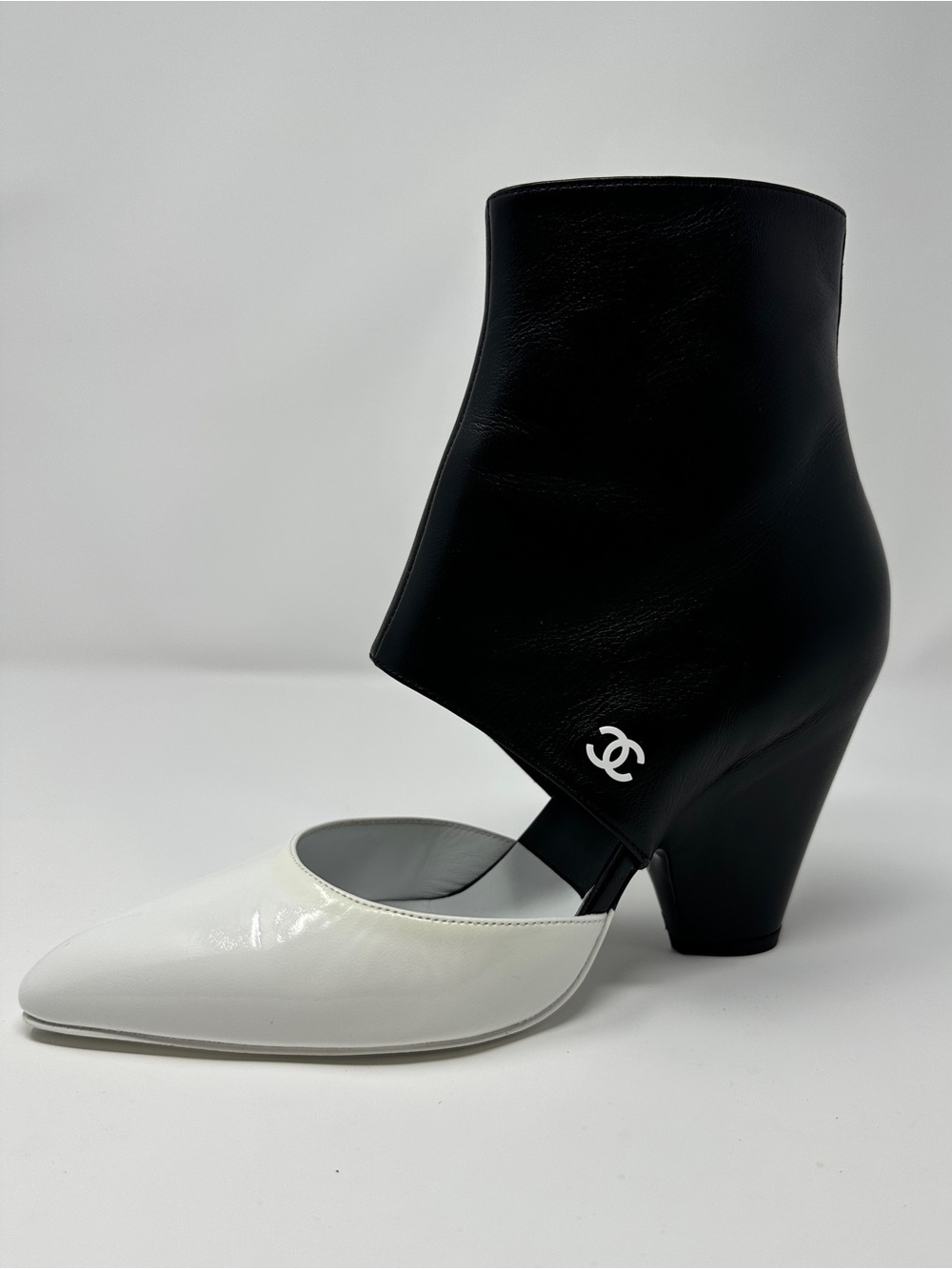 CHANEL Cruise 2020 Runway Two-Tone Cut-Out Booties Black Leather White Patent 37